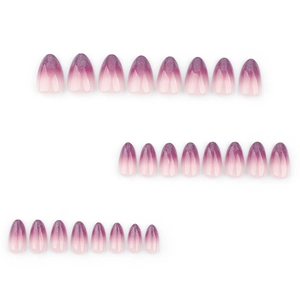 Purple gradient almond fake nails with glitter details set on a white background