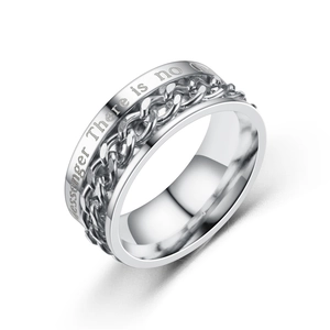 Detail of rotating stainless steel ring with Cuban link chain and engraved text