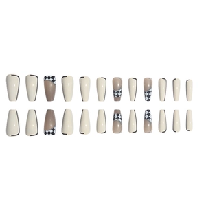 Checkerboard pattern press-on nails in black and off-white long trapezoid shape