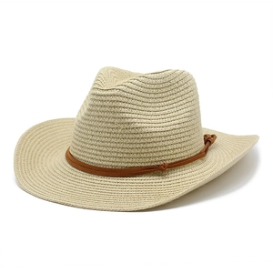 Close-up of beige woven straw hat featuring a brown cord band and vintage texture