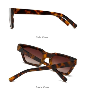 Detail view showing tortoise shell frames and leopard texture on cat eye sunglasses