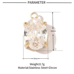 Detail view of gold oval zircon pendant with dimensions 10mm x 6mm and 0.7g weight