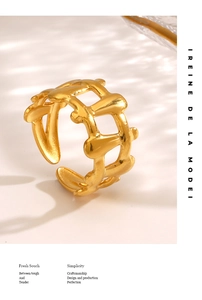 Detail of 18K gold plated stainless steel hollow geometric ring with an open adjustable design