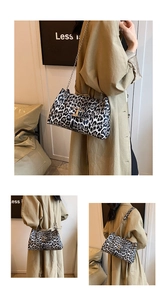 Chic leopard print crossbody bag with metallic chain strap and T-bar buckle detail