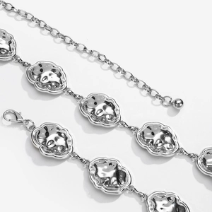 Elegant silver cloud-link metal waist chain belt for women dresses on white background