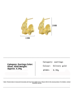 Detailed view of golden irregular flame-shaped earrings with textured finish and measurements