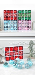 Close-up of 12-pack Christmas ball ornaments with matte and glitter textures in gift boxes
