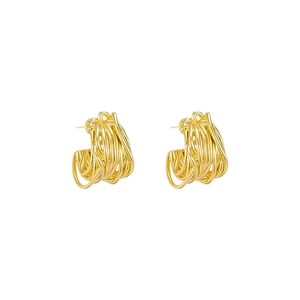 Minimalist twisted gold C-shaped hoop earrings with an irregular geometric metal design