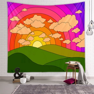 Detail of bohemian rainbow tapestry with vibrant mountain sunset hung on a brick wall