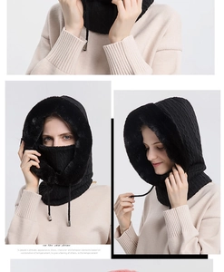 Close-up of black cable-knit winter balaclava with warm faux fur lining and drawstring