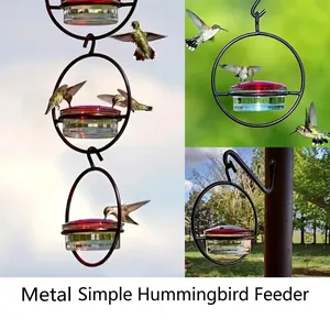 Hanging metal ring hummingbird feeder with red lid for outdoor garden bird feeding