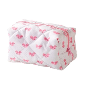 Trousse de maquillage matelassée avec nœuds roses et fermeture éclair de voyage