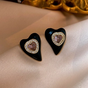 Elegant gold-plated heart earrings with black enamel, pink center stone and micro-diamonds