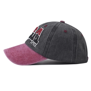 Detail of vintage washed cotton baseball cap with USA embroidery and contrast brim