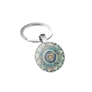 Vintage mandala flower glass dome keychain with antique metal finish and teal pattern