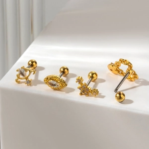 4-piece gold stainless steel earring set with heart, eye and teardrop gem designs