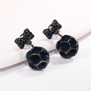 Pendientes de lazo negro elegantes con colgantes de cristal azul oscuro sobre blanco