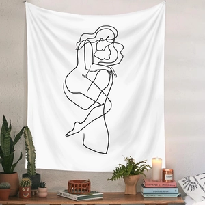 Minimalist line art wall tapestry featuring abstract hugging figures in a cozy home setting