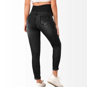 Close-up of the high waist back view showing the pocket details on black maternity jeans