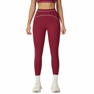 High waist contrast yoga leggings in burgundy with slimming white curved piping design
