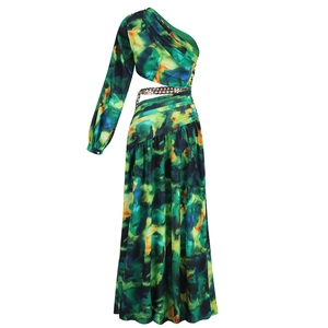 Detail of one-shoulder floral maxi dress with waist cut-out and gold chain belt detail