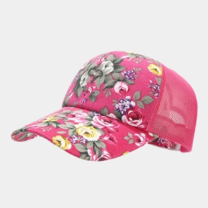 Detail of rose red baseball cap featuring floral pattern fabric and breathable mesh back