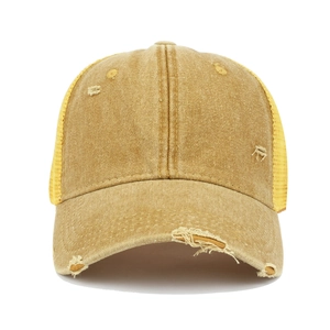 Close-up of distressed vintage baseball cap with washed canvas and breathable mesh