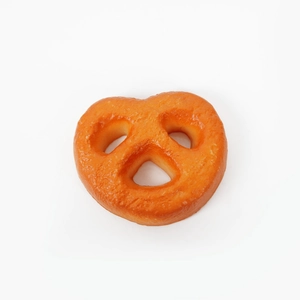 Realistic pretzel-shaped cookie keychain pendant with golden brown baked texture