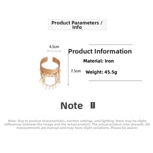 Detail of gold leaf tassel arm cuff bracelet showing iron material and 45.5g weight