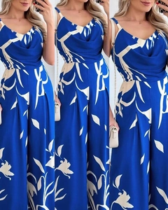 Detail view of blue floral print jumpsuit with V-neckline and wide-leg cut design