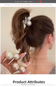 Detailed view of cherry hair clip with pearlescent beads and frosted resin leaf texture