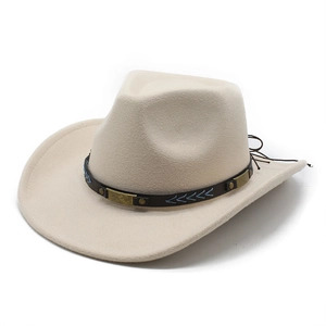Detail of cream felt cowboy hat featuring a leather band with gold metal and blue embroidery