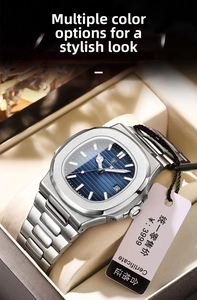 Detailed shot of ultra-thin men's quartz watch with blue dial and steel strap in gift box
