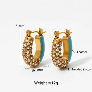 Golden U-shaped hoop earrings with blue enamel and sparkling cubic zirconia stones