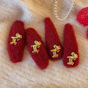 Set di quattro fermagli per capelli in peluche rosso con ciondoli a forma di cucciolo
