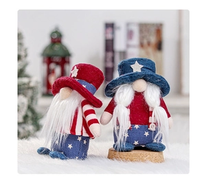 Macro view of patriotic Independence Day gnomes with stars and stripes on plush carpet