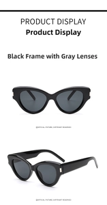 Detail view of cat-eye sunglasses with glossy black frames and dark grey lenses