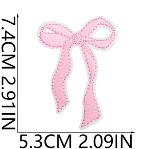 Pink bow embroidery patch dimensions showing height 7.4cm and width 5.3cm for clothing repair