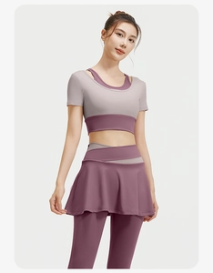 Detail of high-elasticity yoga set showing mauve high-waisted shorts and running top