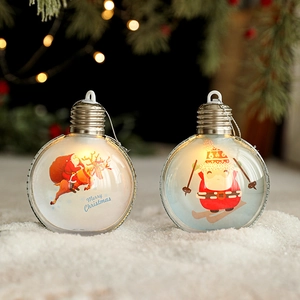 Luminous Christmas ball with Santa Claus painting on snow scene for holiday tree decor