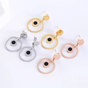 Three pairs of stainless steel hoop earrings with Roman numerals in gold, silver, and rose gold