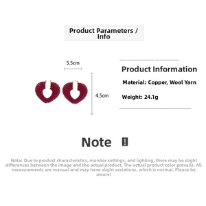 Detail shot of heart-shaped knit earrings in reddish brown with copper frame