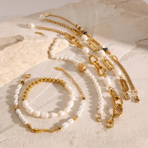 Gold stainless steel pearl bracelet and necklace set with baroque pearls on stone