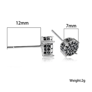 Macro detail of silver stud earrings with black cubic zirconia and 7mm diameter specifications