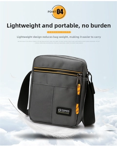 Men's grey oxford shoulder bag with yellow zippers and lightweight design