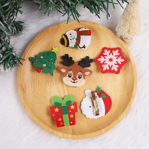Christmas acrylic hair clip set with Santa, reindeer and tree shapes on metal duckbill clips