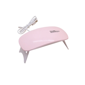 Mini lampada per unghie UV LED rosa SUNmini con cavo USB e supporti pieghevoli su sfondo bianco