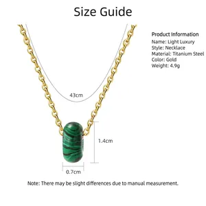 Gold stainless steel necklace with green striped pendant and clear size specifications