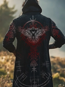 Detailed back view of a hooded Viking cloak with intricate raven print and geometric patterns