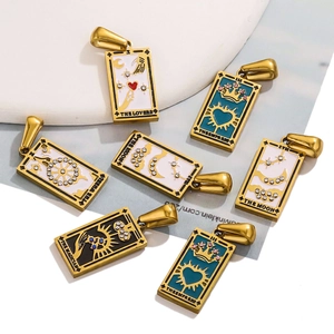 Golden tarot card pendants with colorful enamel details and small inlaid diamonds